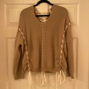 Sweater by Miracle. Made in USA.  Tan with white laces.  Very unusual top.